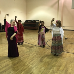 Aurora Reyes instructs 3 seniors in castanets at xxx in Corona 2019